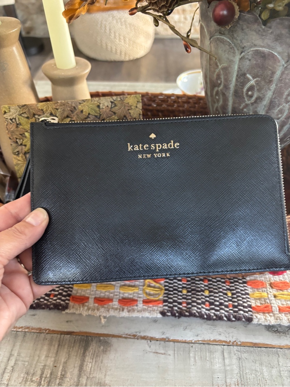 kate spade black leather zip pouch with gold logo